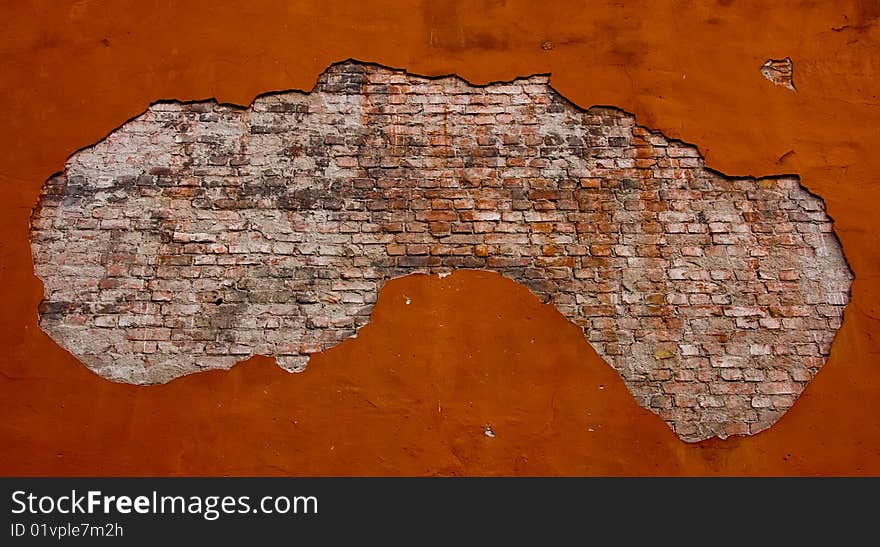 Old weathered grunge brick wall in the frame