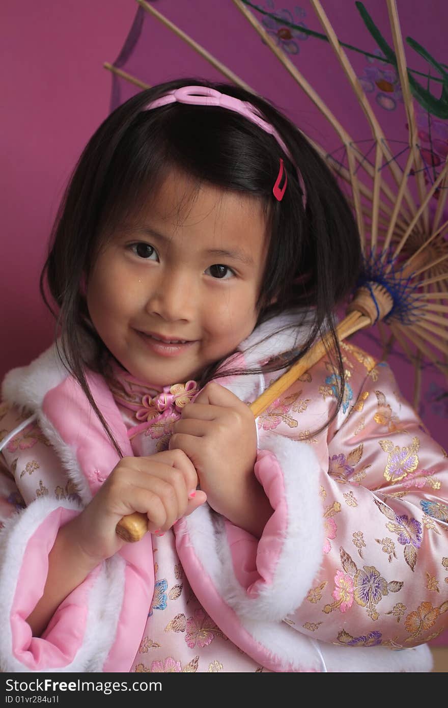 Little Chinese Girl With Unbrella