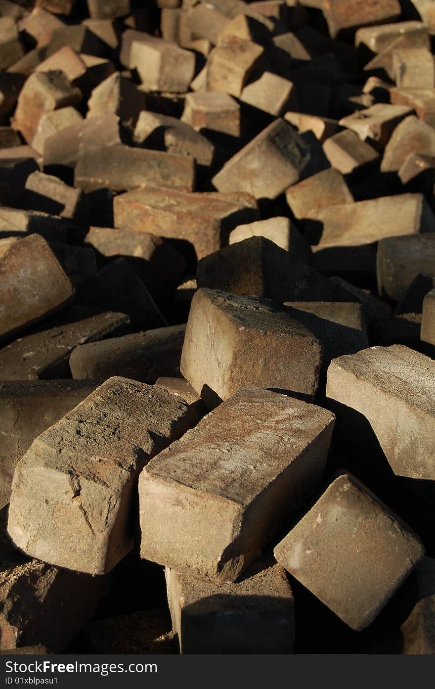 A collection of Bricks and stones in the sun