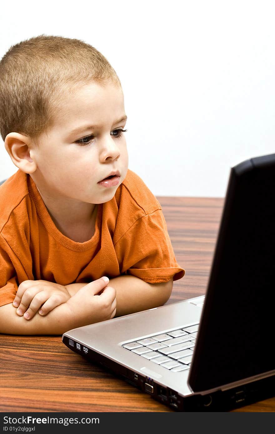 Adorable Boy With Working On Laptop. Adorable Boy With Working On Laptop