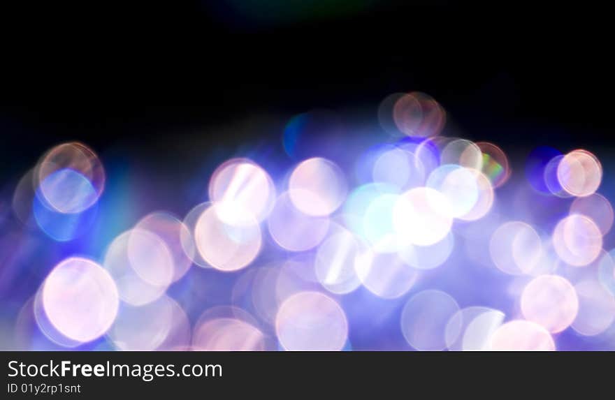 Beautiful abstract colorful background of holiday lights. Beautiful abstract colorful background of holiday lights