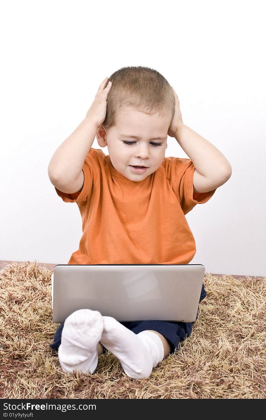 Adorable Boy With Working On Laptop. Adorable Boy With Working On Laptop