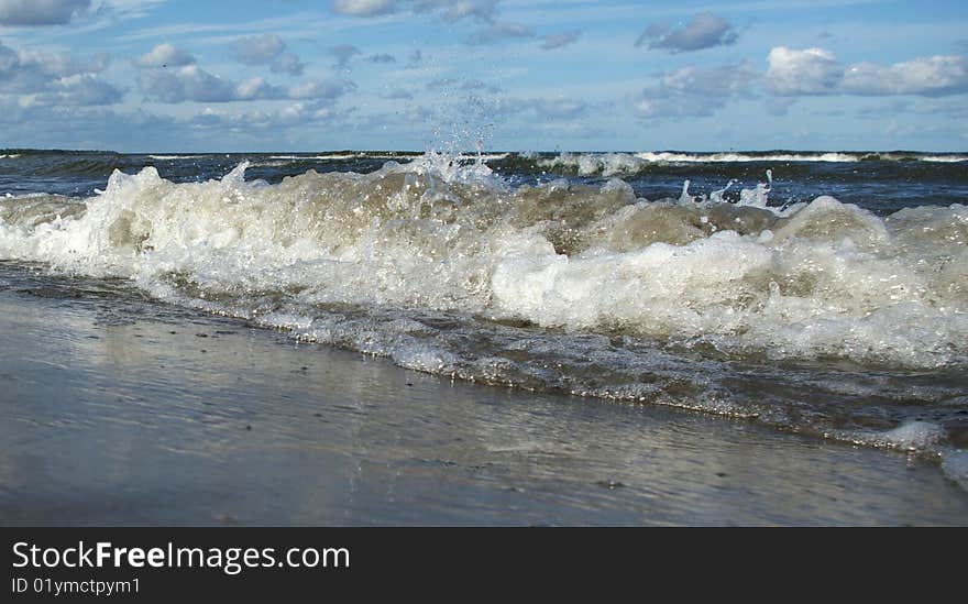 Waves in the sea on blue sky. Waves in the sea on blue sky.