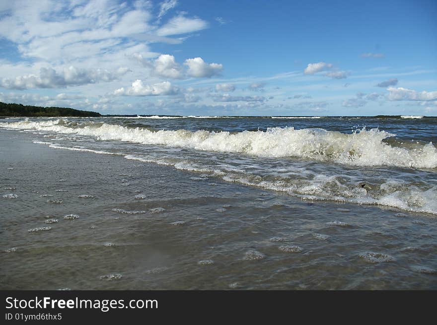 Waves in the sea on blue sky. Waves in the sea on blue sky.