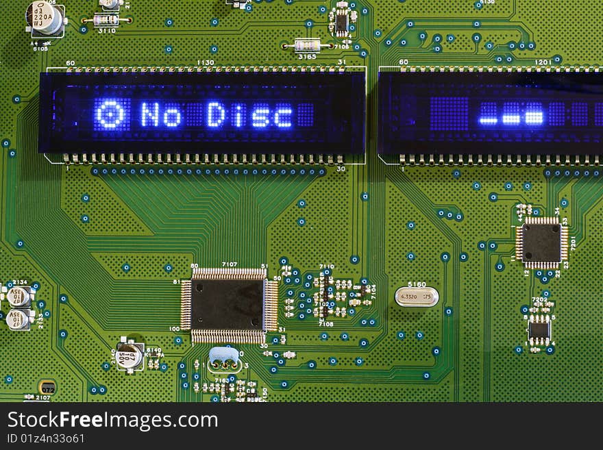 Printed circuit board with blue display. Message No Disc. Printed circuit board with blue display. Message No Disc.