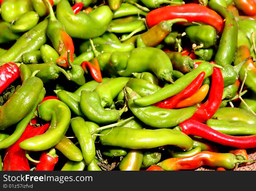 Coloured red and green chili peppers in a market in morocco, africa