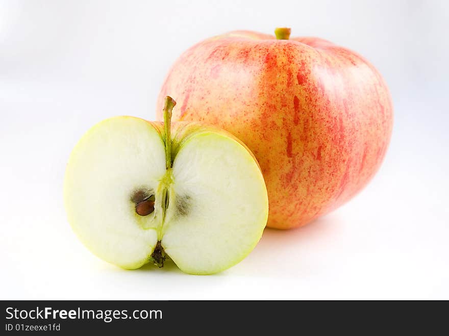 Red apple and half of green apple. Red apple and half of green apple