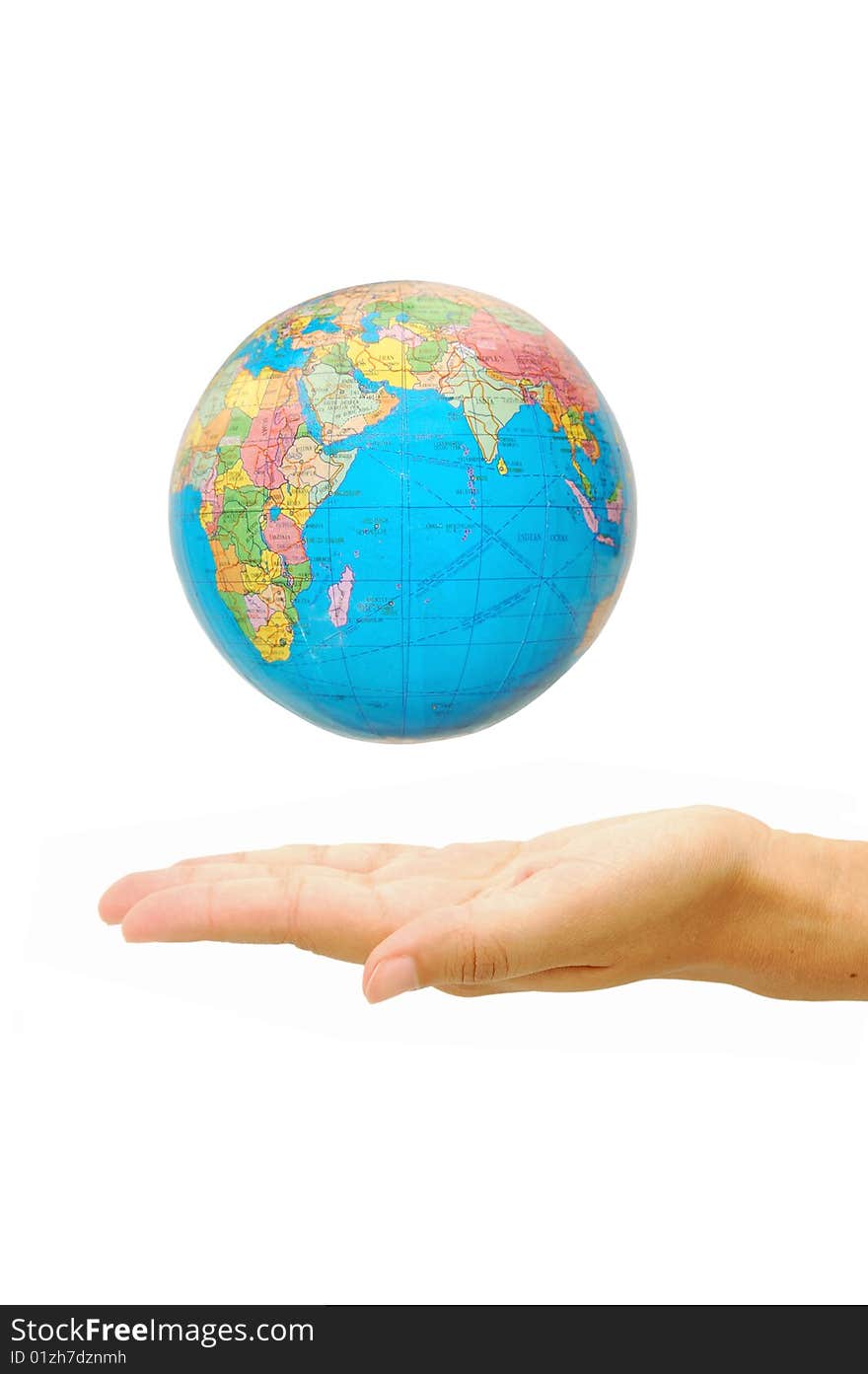 Globe floating above a hand. Globe floating above a hand