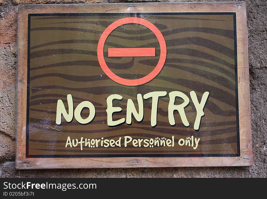 A sign with 'no entry' - 'authorised personnel only' on display