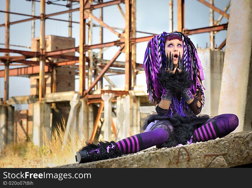 Cyber gothic girl in the industrial environment