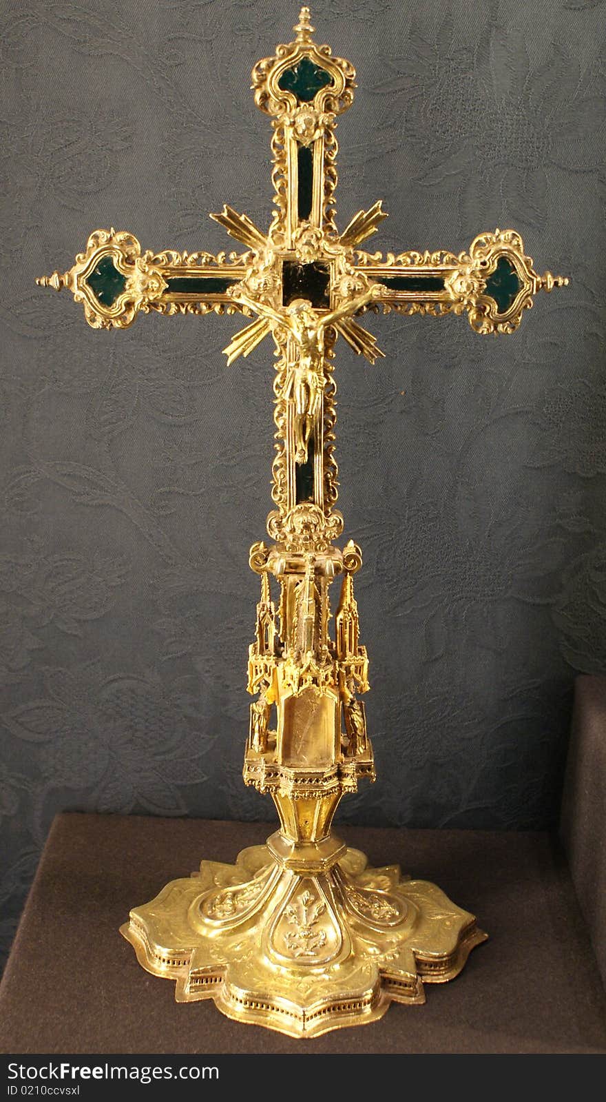 Close up of a golden cross representing religion