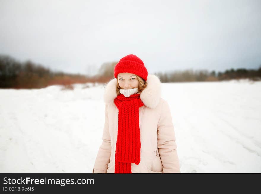 Girl in red hat and scarf