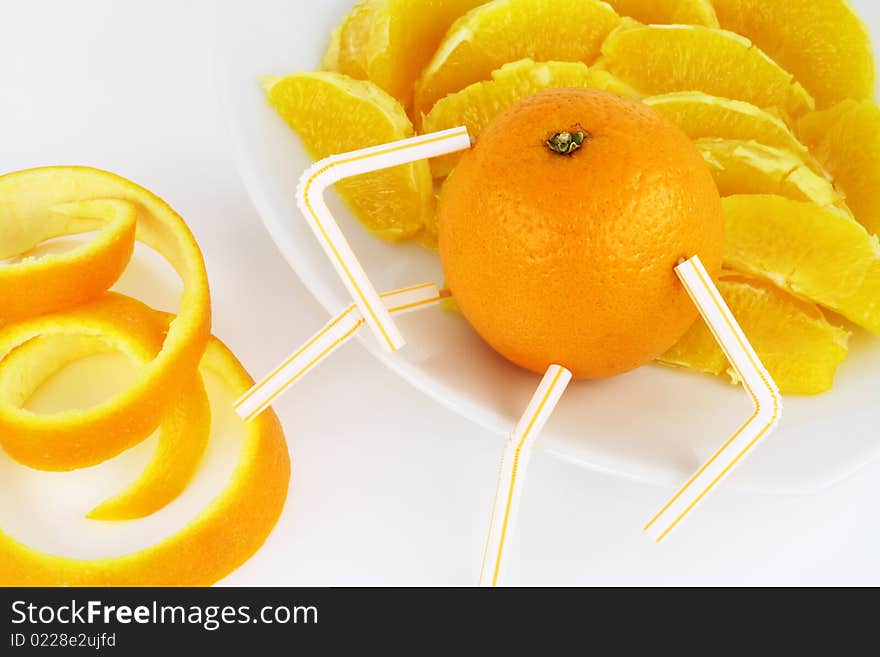 Orange and orange segments on a plate