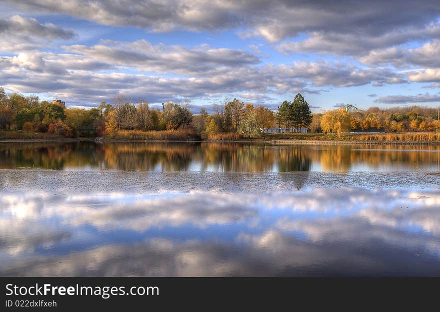 Panoramic view of a lake with a symetrical effect. Panoramic view of a lake with a symetrical effect