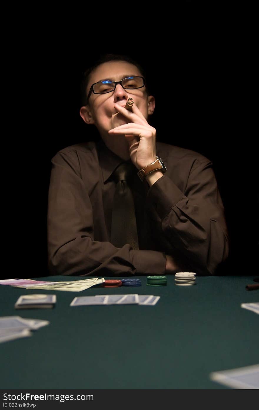 Smoker at the poker table