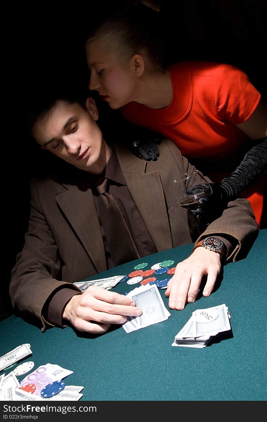 Couple of young gamblers at the poker table. Couple of young gamblers at the poker table