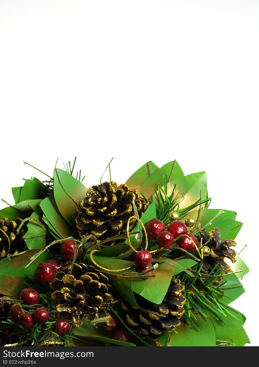 Pine cones and berries on a white background with copyspace. Pine cones and berries on a white background with copyspace