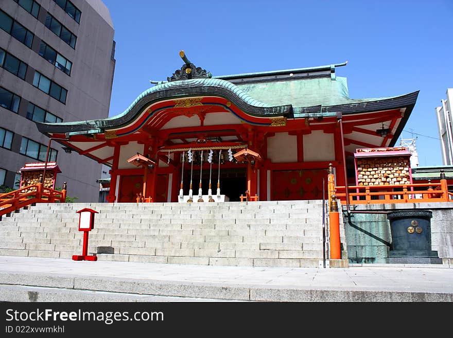 Hanazono Shinto Shrine and office building in Tokyo's Shinjuku ward. Hanazono Shinto Shrine and office building in Tokyo's Shinjuku ward