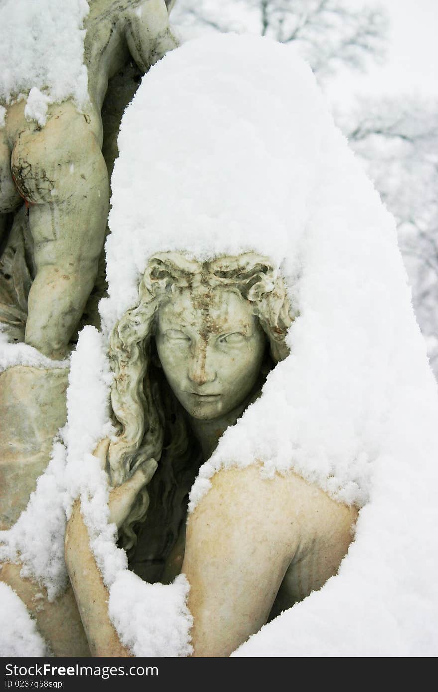 Female monument under a big snow fall duting last winter. Female monument under a big snow fall duting last winter