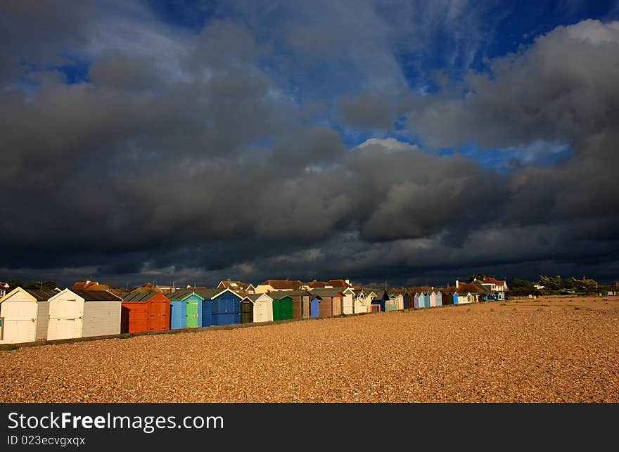 Beach Huts with stormy sky