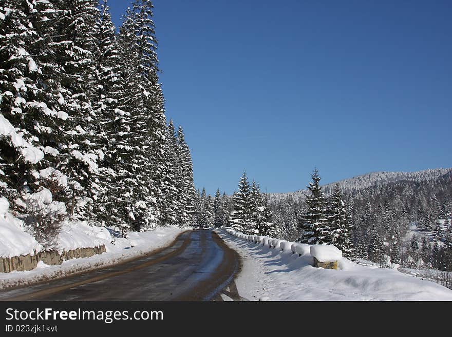 Road crossing the mountains  in winter. Road crossing the mountains  in winter