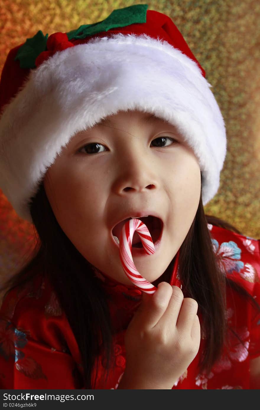 Asian Girl with candy cane