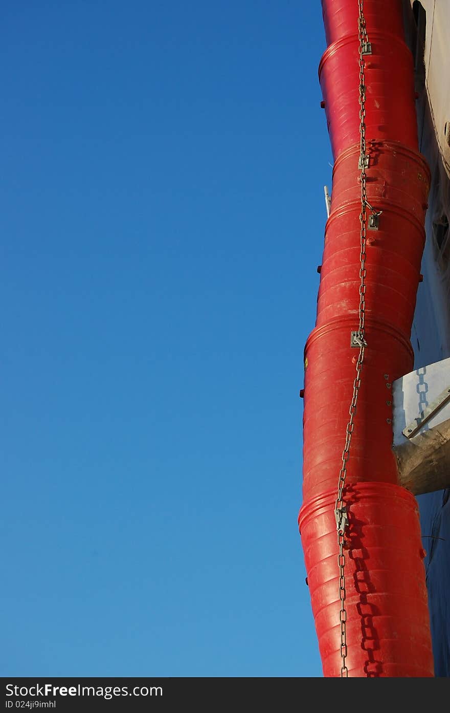 A line of Buckets with a blue sky. A line of Buckets with a blue sky