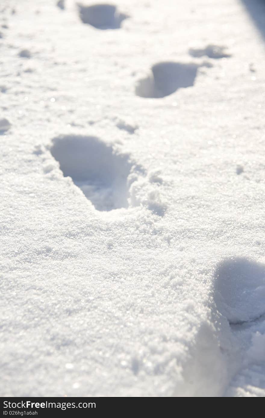 A human presence in the snow can used as a background. A human presence in the snow can used as a background