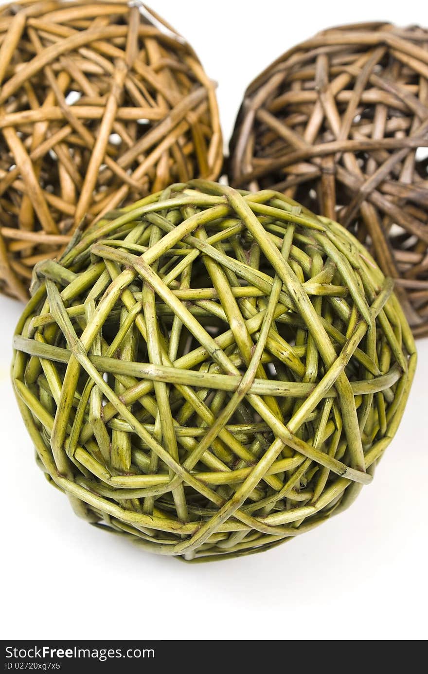 Three wood globes on white background