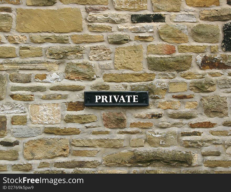 Private - Sign On Stone Fire-wall