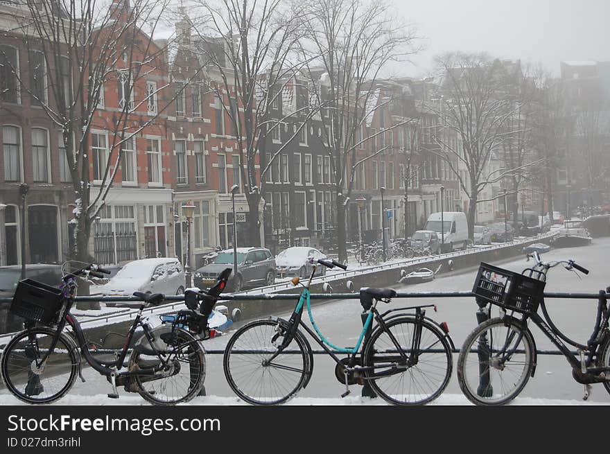 Canal houses in the snow in Amsterdam. Canal houses in the snow in Amsterdam