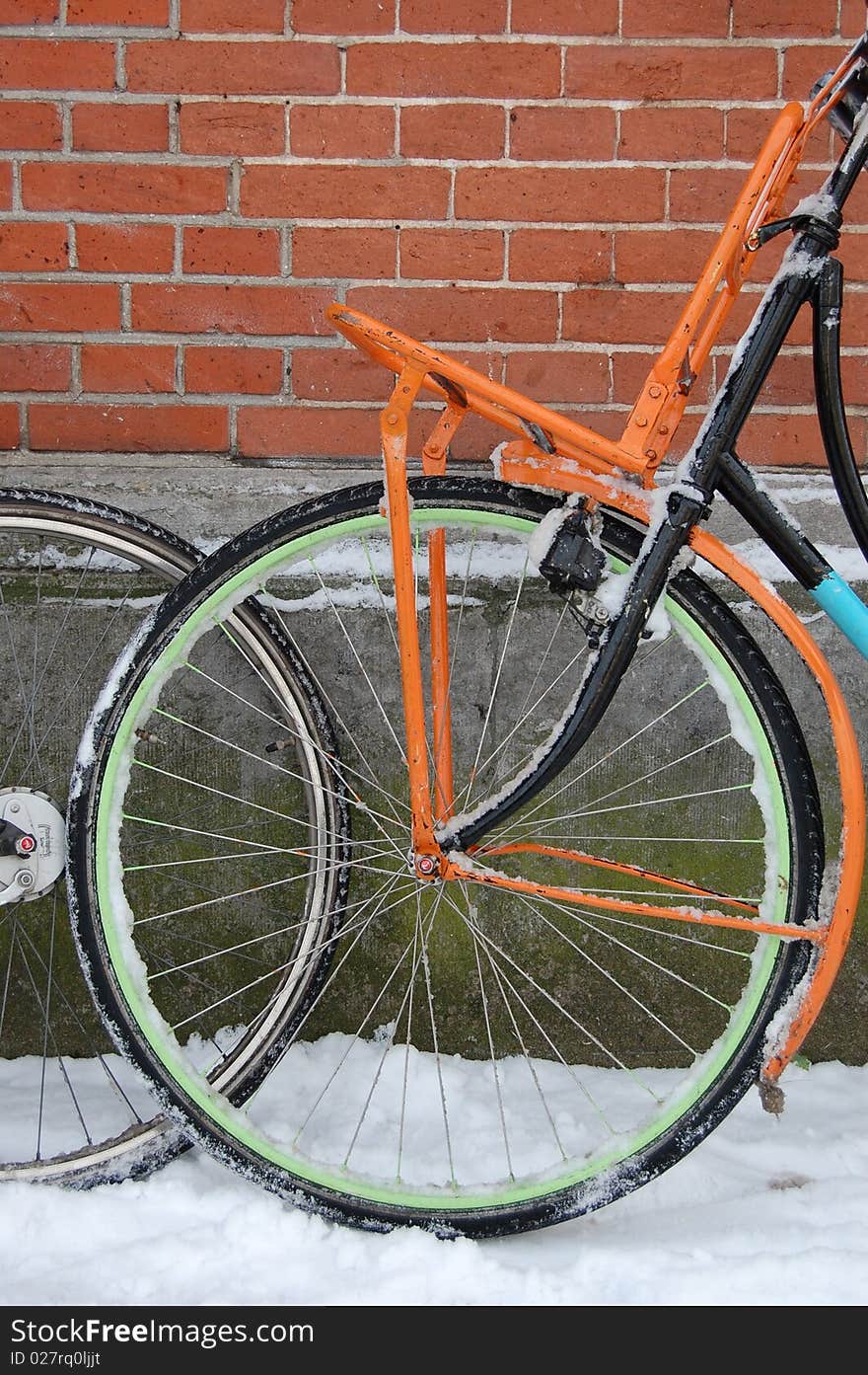 Bike with snow in Amsterdam