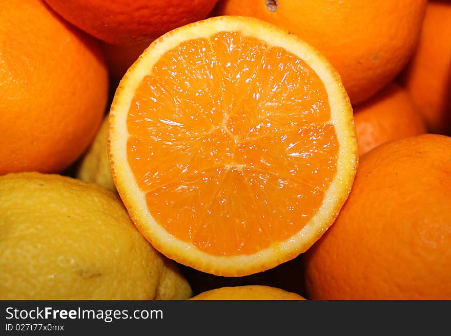 The photo of oranges and lemons