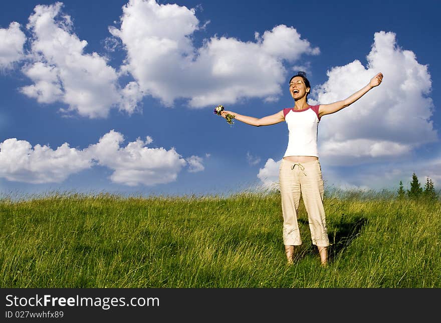 Young Happy Woman In Meadow