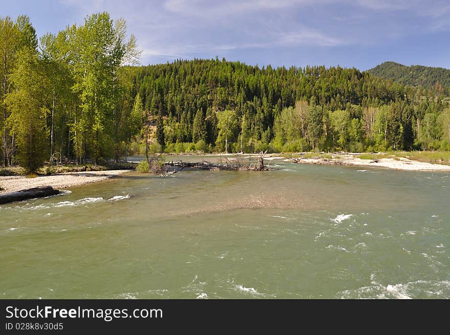 This is a photograph of the St. Regis River in the Lolo National Forest near St. Regis, Montana. A circular polarizing filter was used.