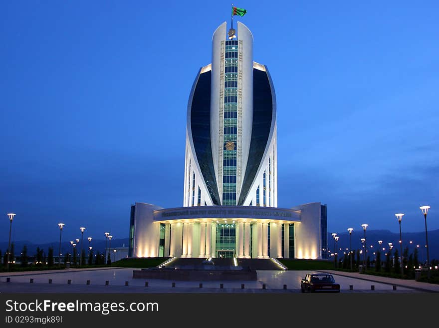 Administration building on the night sky as a background. Ashkhabad. Turkmenistan.