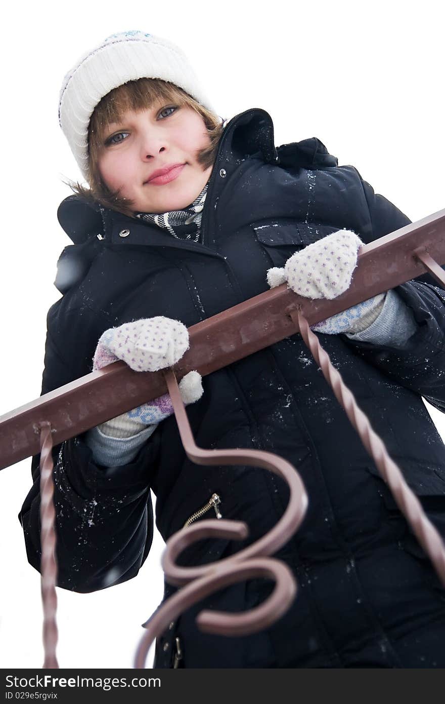 Girl at the balcony in winter day