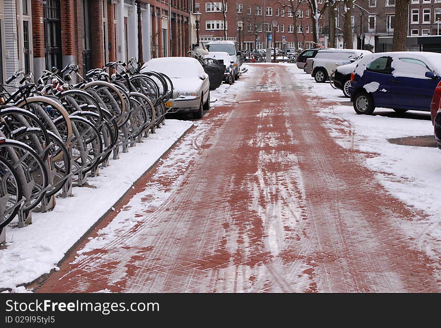 Snowy street in Amsterdam during winter