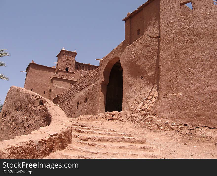 A kasbahis a type of medina, Islamic city, or fortress.
It was a place for the local leader to live and as a defense when the city was under attack. A kasbah has high walls which usually have no windows. Sometimes, they were built on the top of hill to make them easier to defend. Some of them were also placed near the entrance of harbors.

Having a kasbah built was a sign of wealth of some families in the city. Almost all cities had their kasbah, this building being something necessary for the city to survive. A kasbahis a type of medina, Islamic city, or fortress.
It was a place for the local leader to live and as a defense when the city was under attack. A kasbah has high walls which usually have no windows. Sometimes, they were built on the top of hill to make them easier to defend. Some of them were also placed near the entrance of harbors.

Having a kasbah built was a sign of wealth of some families in the city. Almost all cities had their kasbah, this building being something necessary for the city to survive.