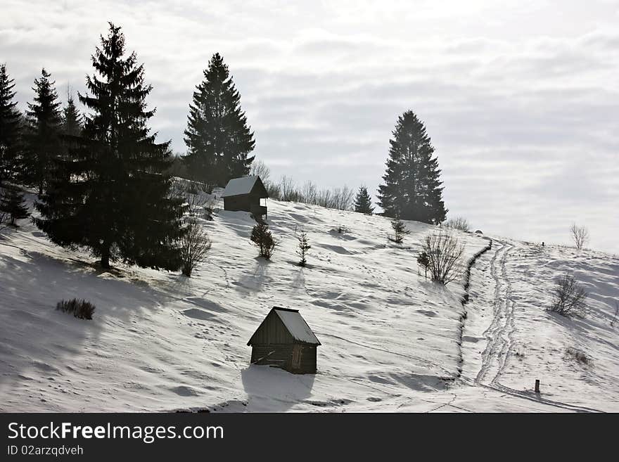 Wooden cottage in the mountains. Wooden cottage in the mountains