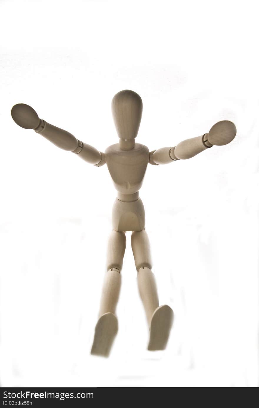 Wooden figure with a white back ground. Wooden figure with a white back ground