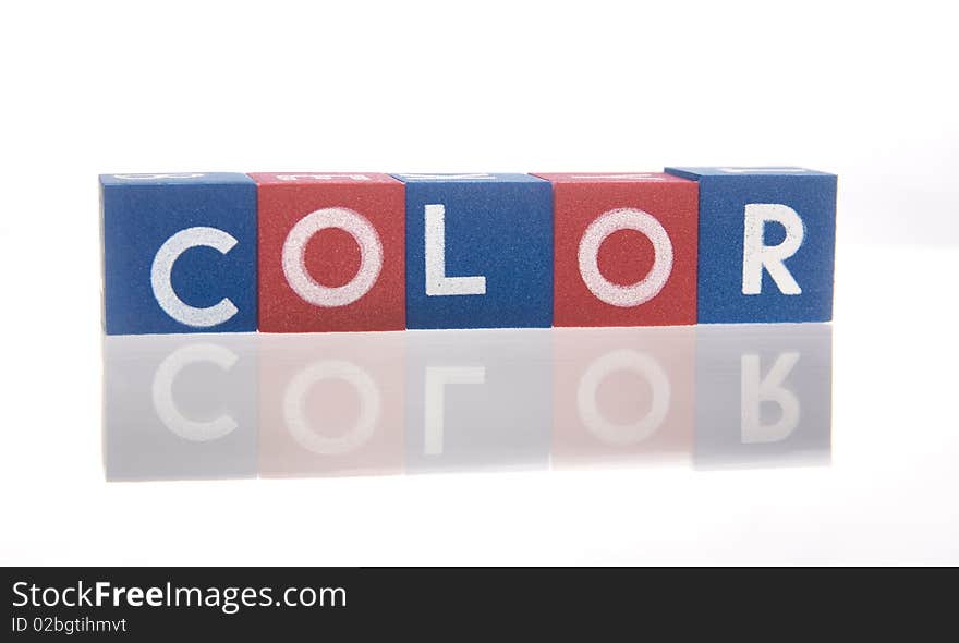 Colored alphabetical cubes presenting words