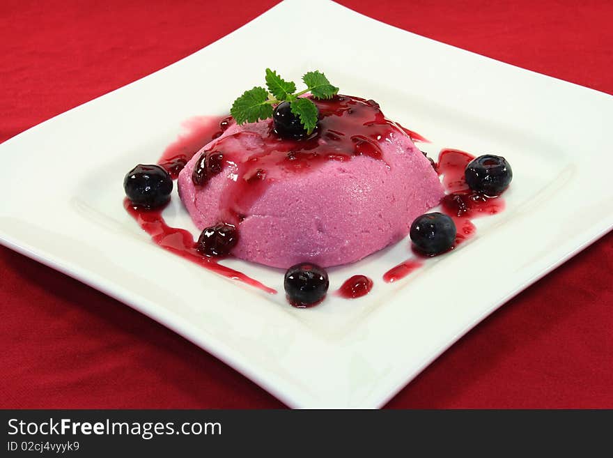 Blueberry dessert on a white plate