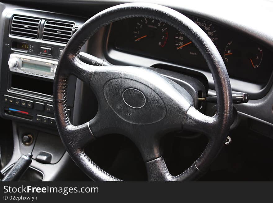 Sedan dashboard, focused on the steer. Sedan dashboard, focused on the steer