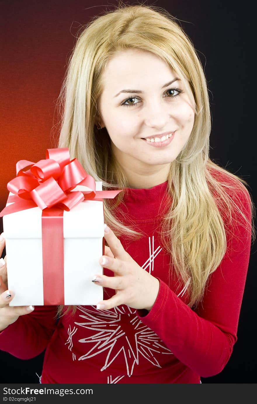 Happy young girl with gift box. Happy young girl with gift box