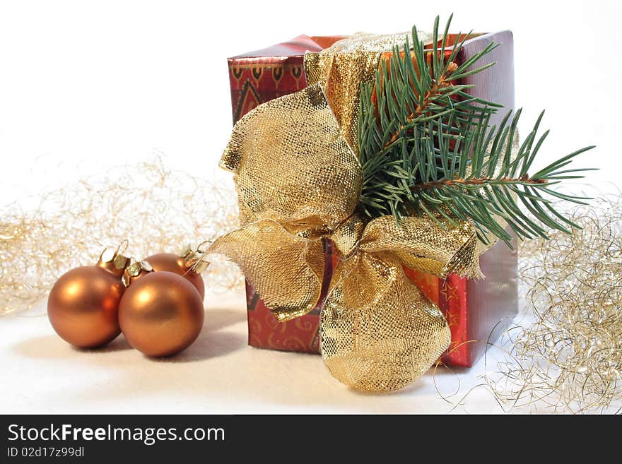 Christmas present with Christmas baubles and angel hair. Christmas present with Christmas baubles and angel hair