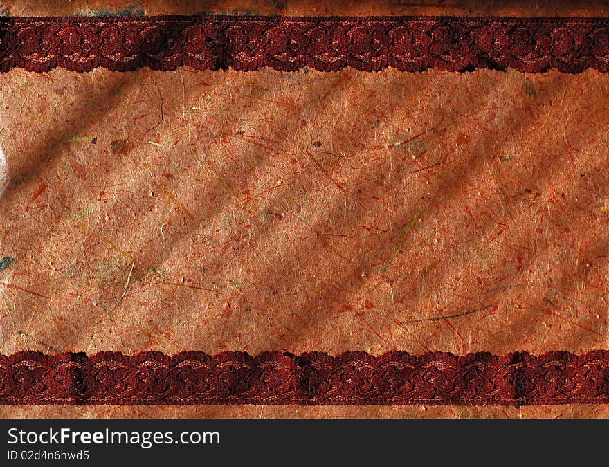 Rust banana bark paper background with brown lace borders and stripes of shadows. Rust banana bark paper background with brown lace borders and stripes of shadows.