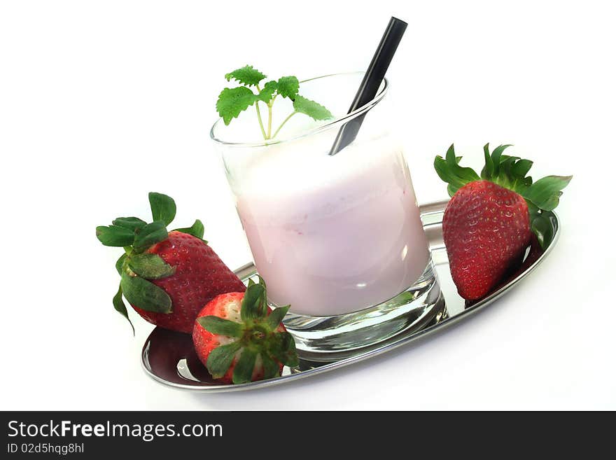 Strawberry shake with fresh strawberries on a white background