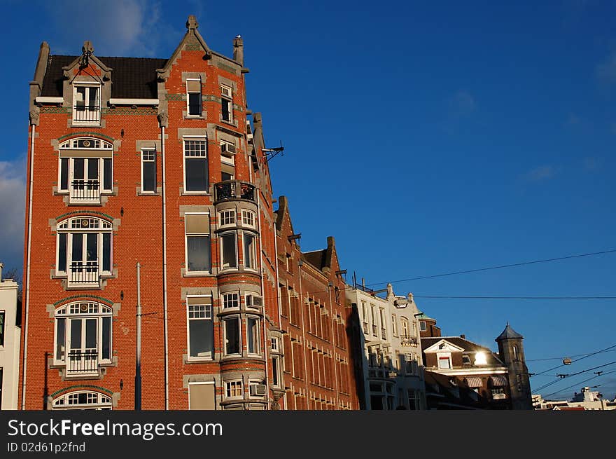 Old building with a blue sky in the center of Amsterdam, looking like a castle. Old building with a blue sky in the center of Amsterdam, looking like a castle