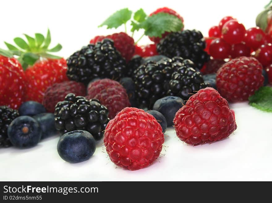 Different berries on a white background